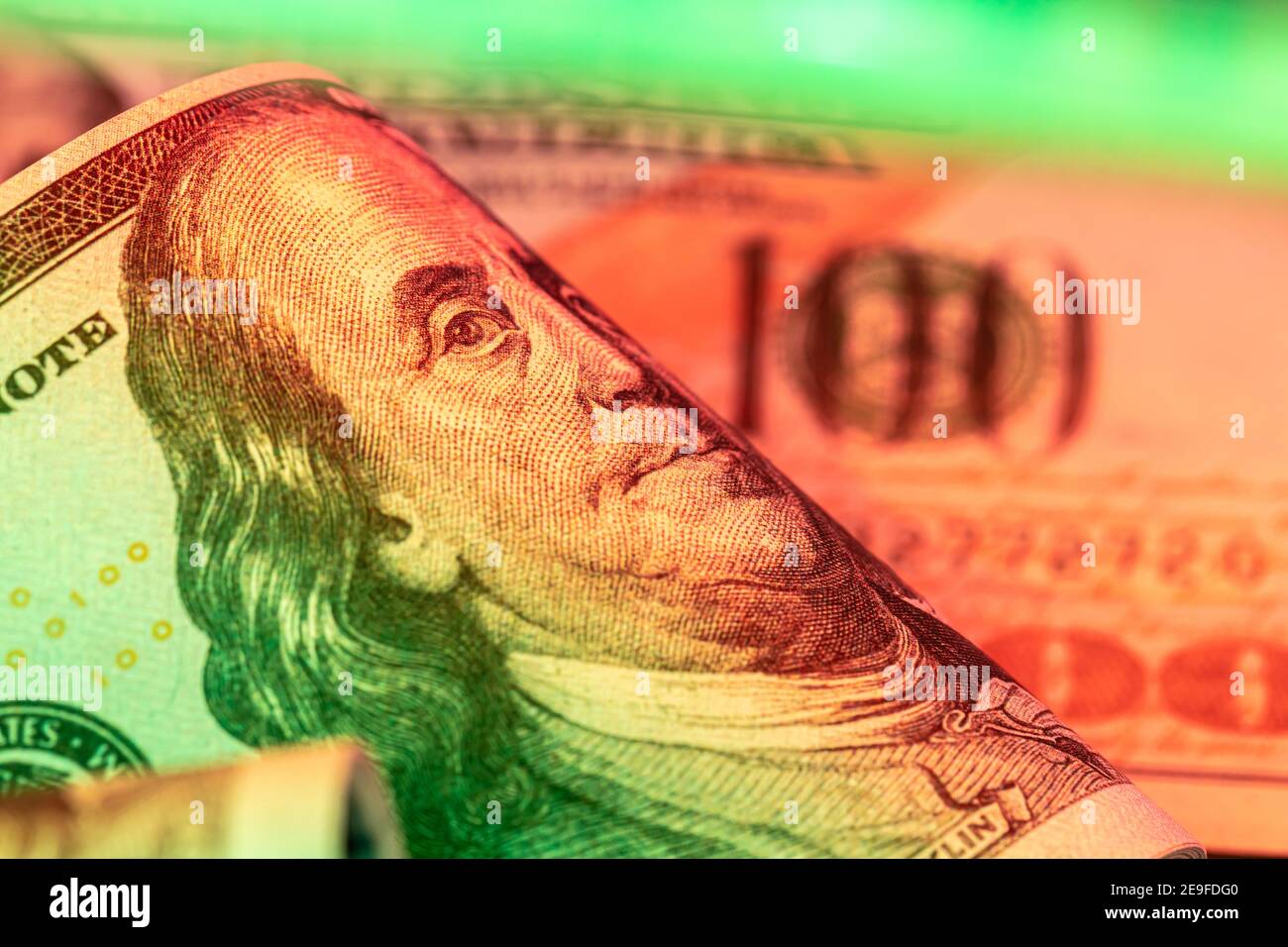 money background from dollars in neon light, close up Stock Photo - Alamy