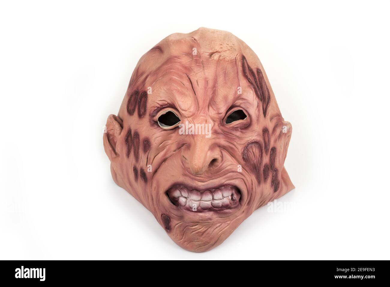 Halloween rubber mask on a white background Stock Photo - Alamy