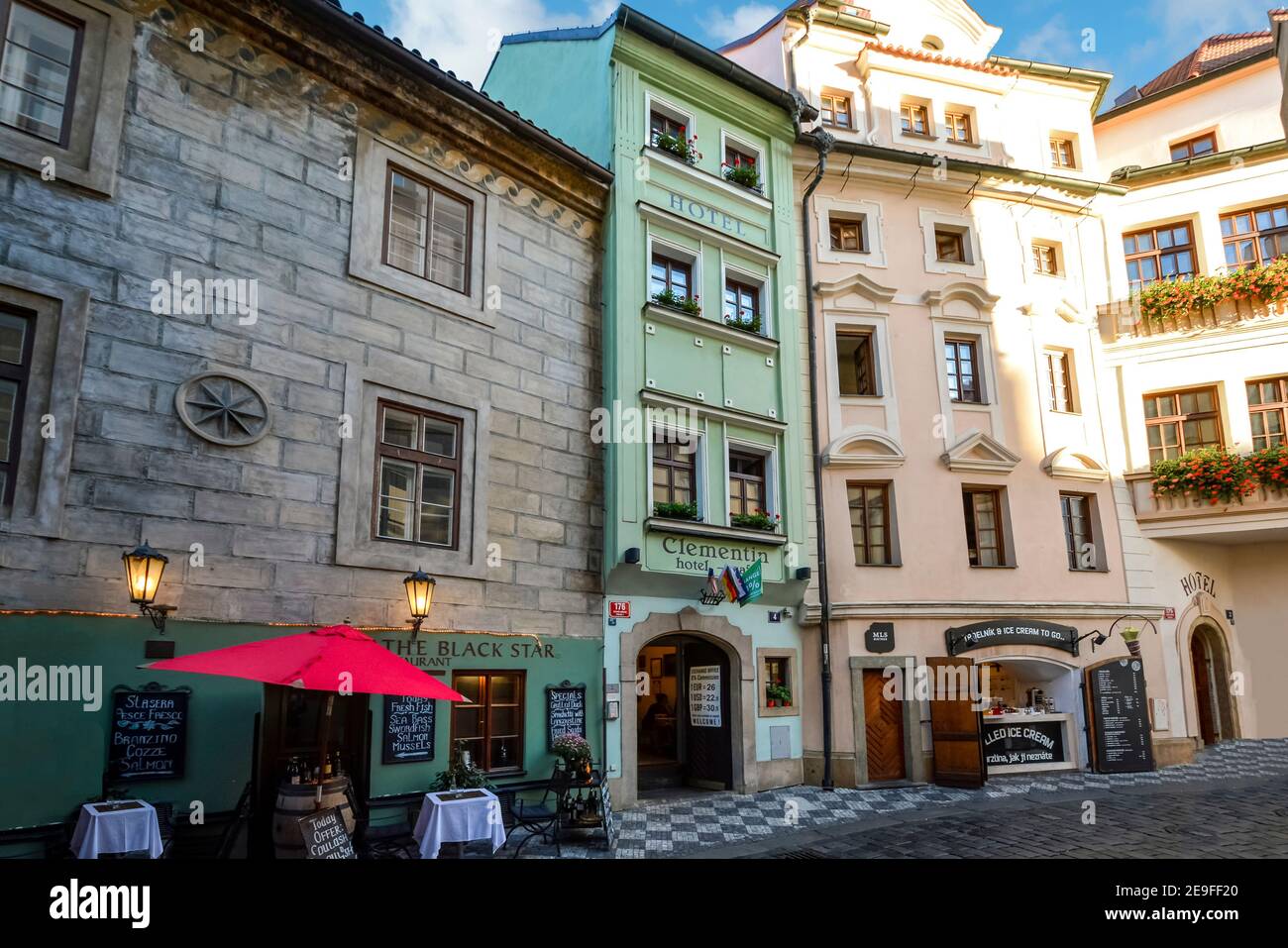 A typical row of cafes and hotels in the historic center of Old Town Prague, Czechia. Stock Photo