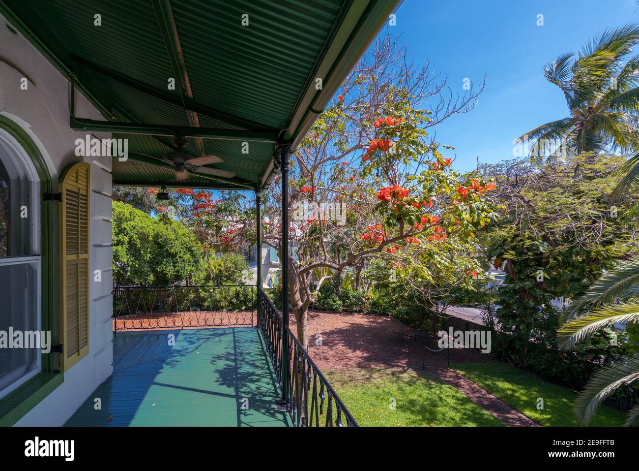 Porch of wooden house in spanish colonial style with a porch. Wooden