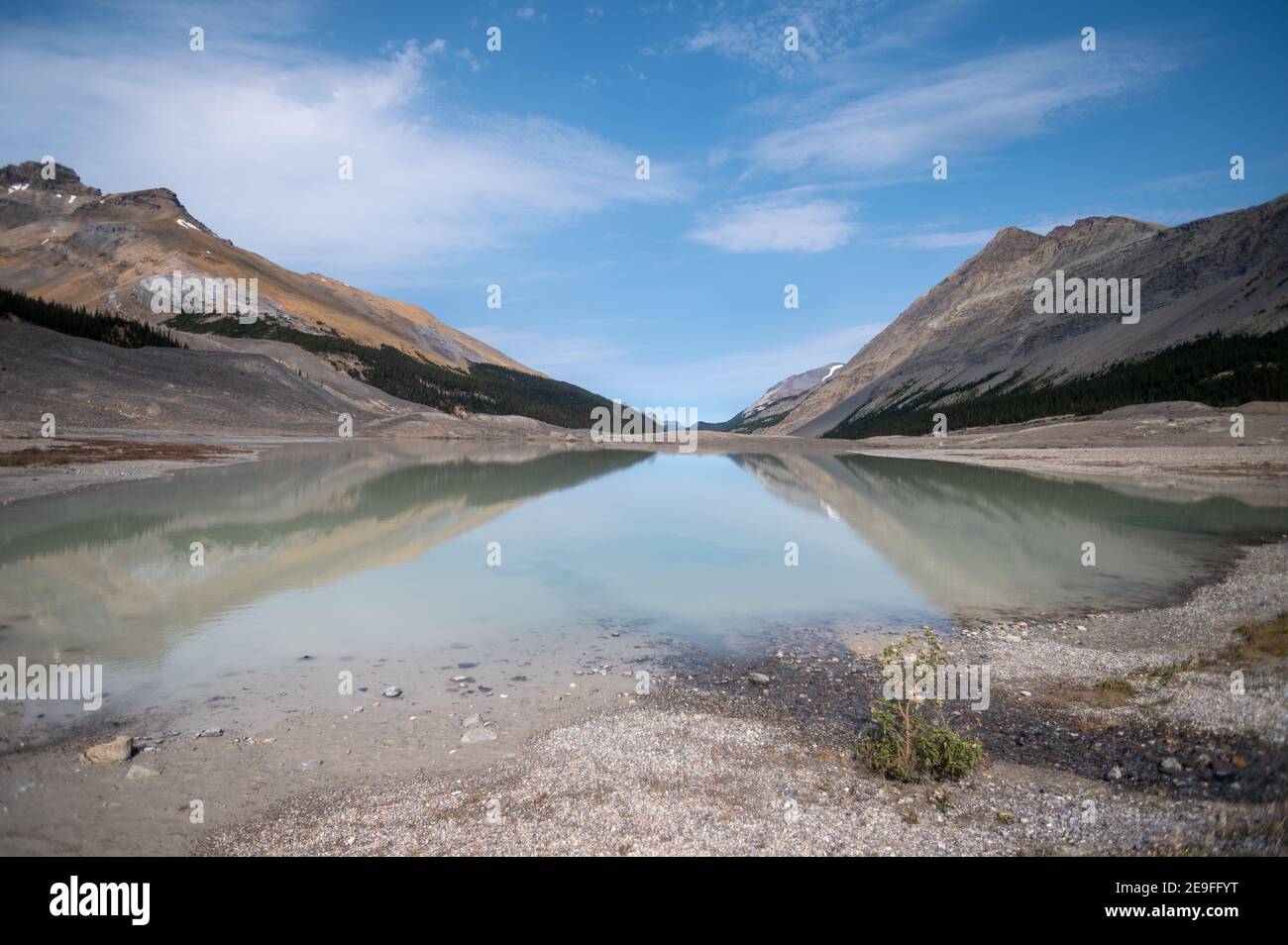 Closeup shot of a lake surrounded by rocky hills Stock Photo - Alamy