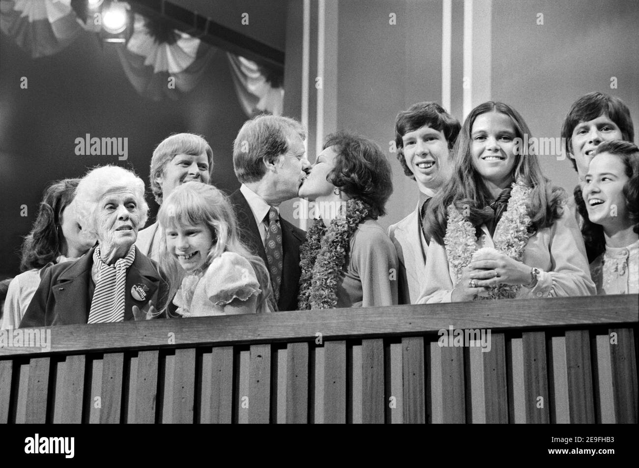 Jimmy Carter and Rosalynn Carter kissing, surrounded by family including Amy Carter and Lillian Carter, at Democratic National Convention, New York City, New York, USA, Warren K. Leffler, July 15, 1976 Stock Photo