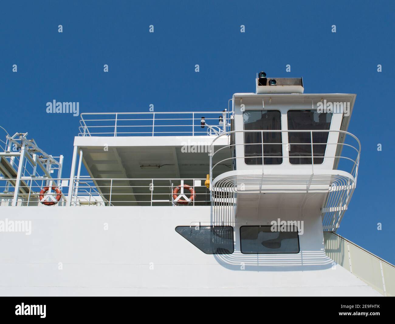 Detail of control bridge on a passenger ferry, navigation and communication tower and equipment, signal lights Stock Photo