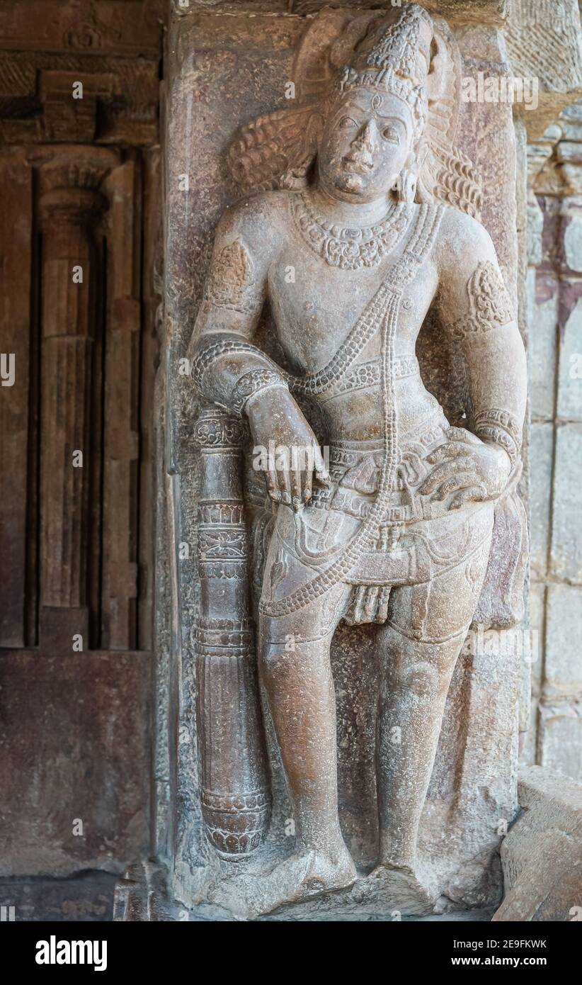 Bagalakote, Karnataka, India - November 7, 2013: Pattadakal temple complex. Closeup of gray stone statue of dwarapalaka at entrance to Virupaksha temp Stock Photo