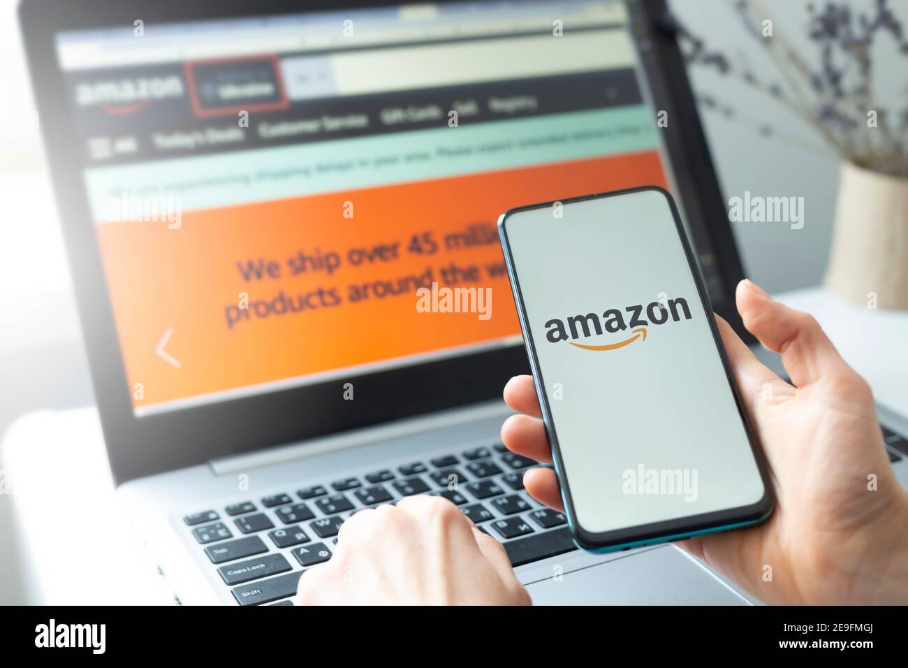 Kyiv, Ukraine - Feb. 02, 2021: Buying goods in the Amazon online shop store  using a smartphone and laptop Stock Photo - Alamy