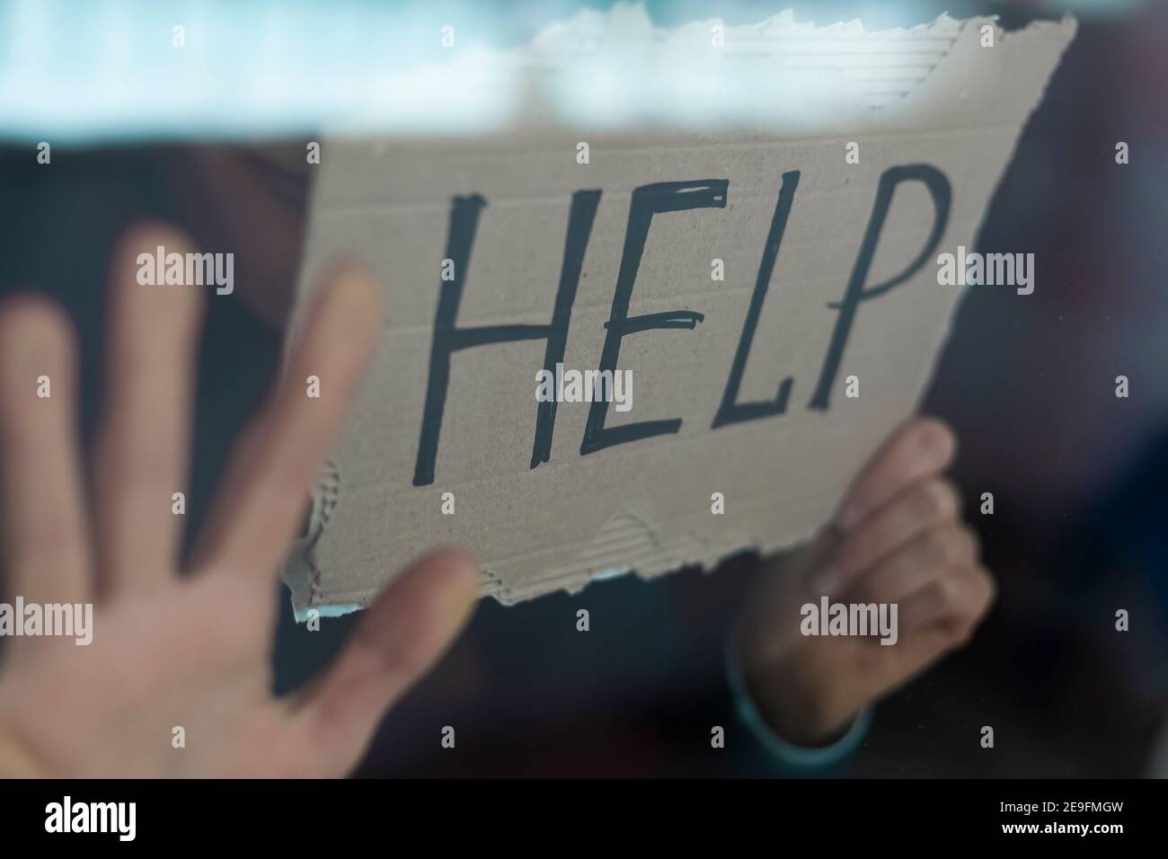 Domestic violence concept. The woman asks for help. Stock Photo
