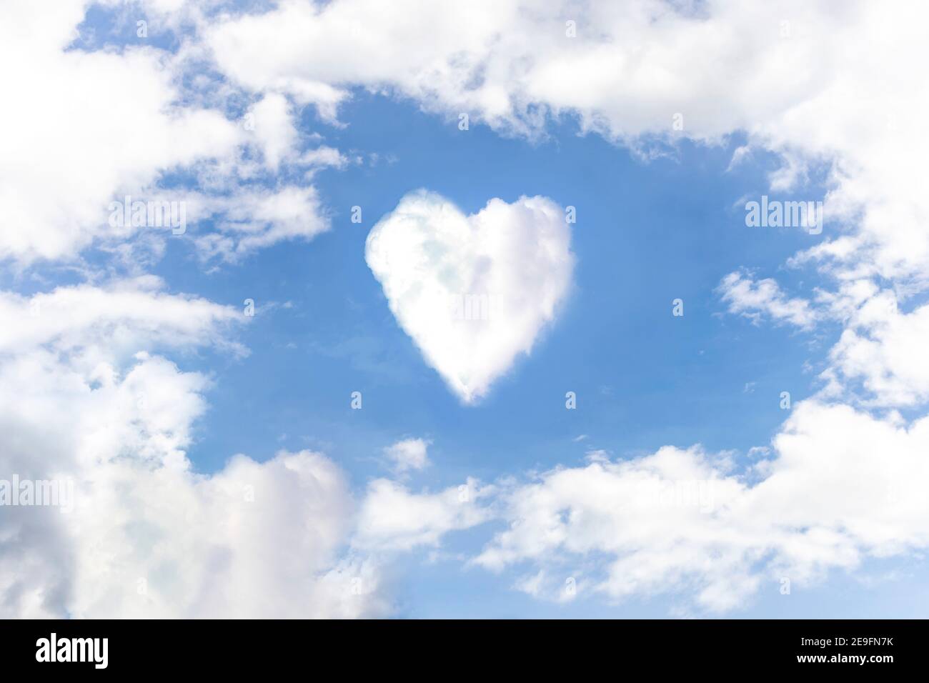 Heart on the sky with cloudy. Blue sky with hearts shape clouds natural  background. love concept Stock Photo - Alamy