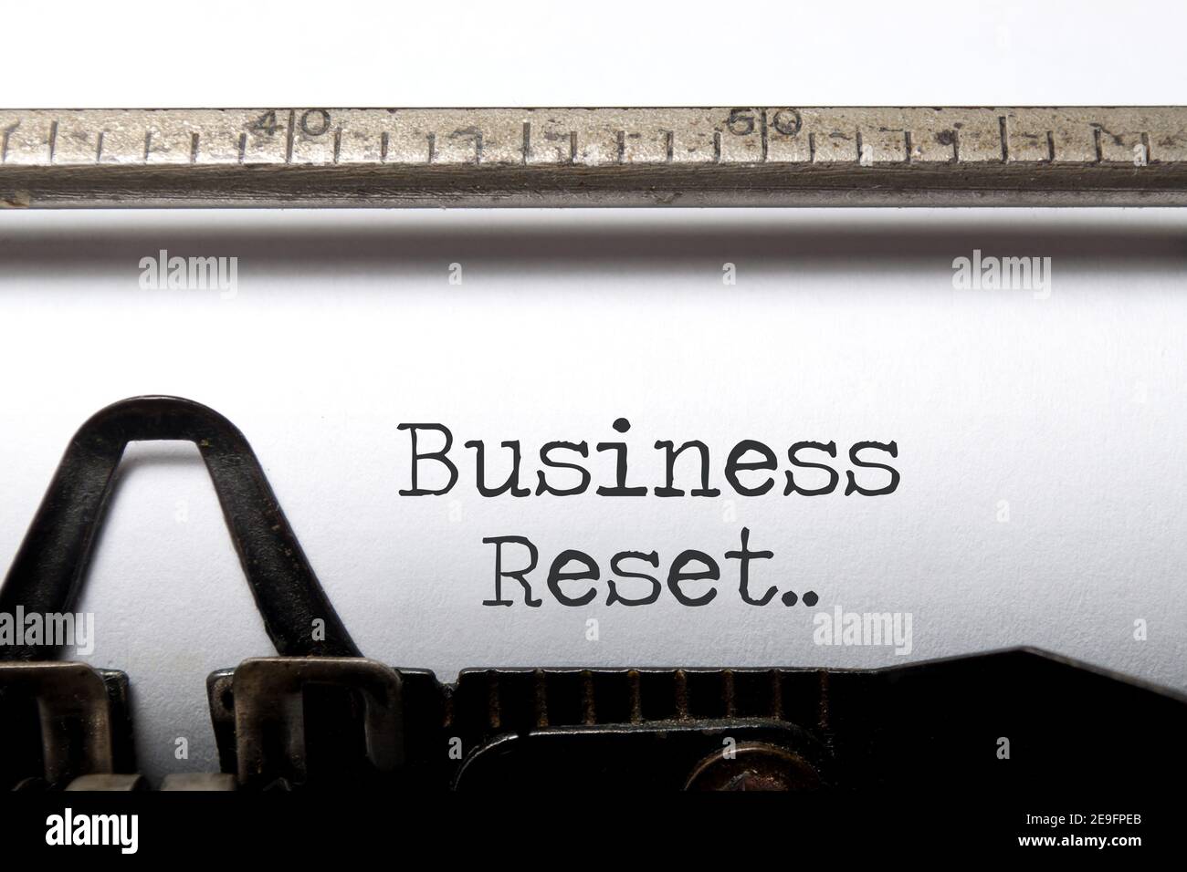 Business reset written on a vintage typewriter Stock Photo