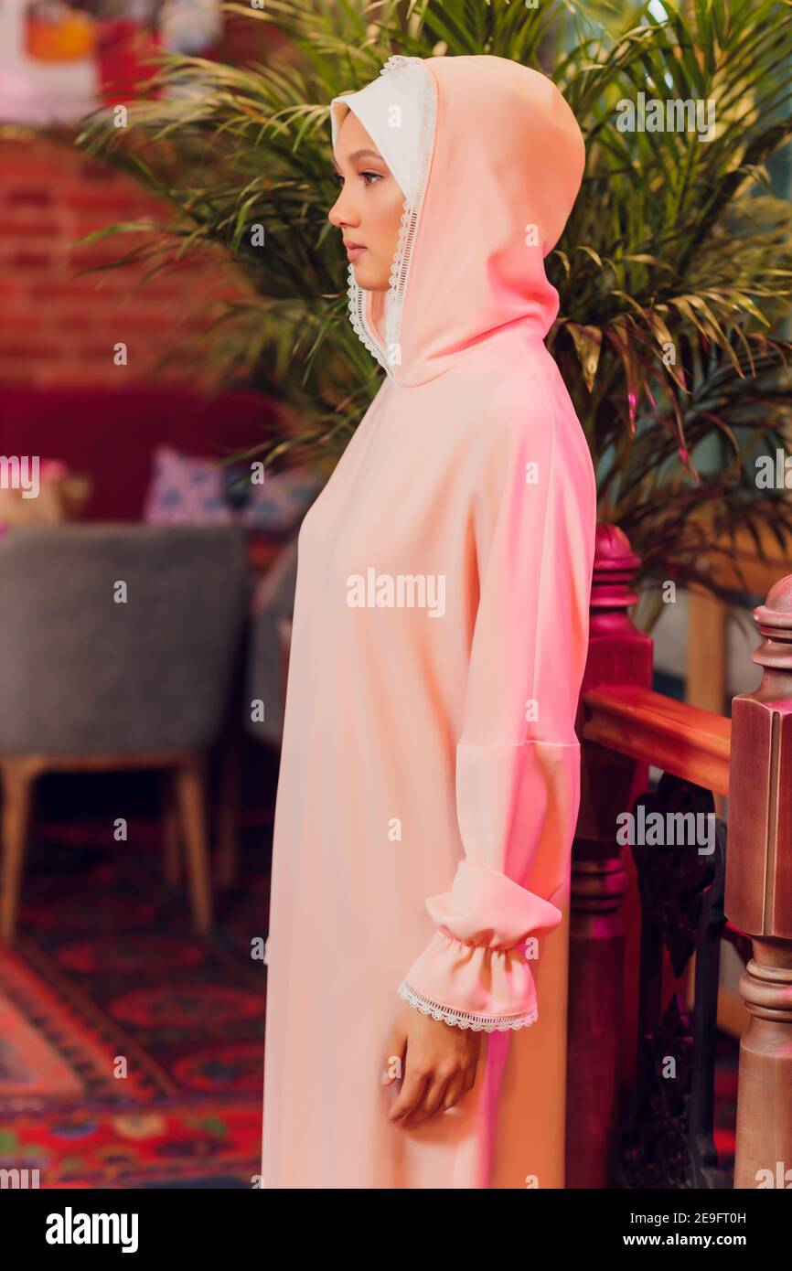 beautiful young woman with a pink hijab Stock Photo - Alamy