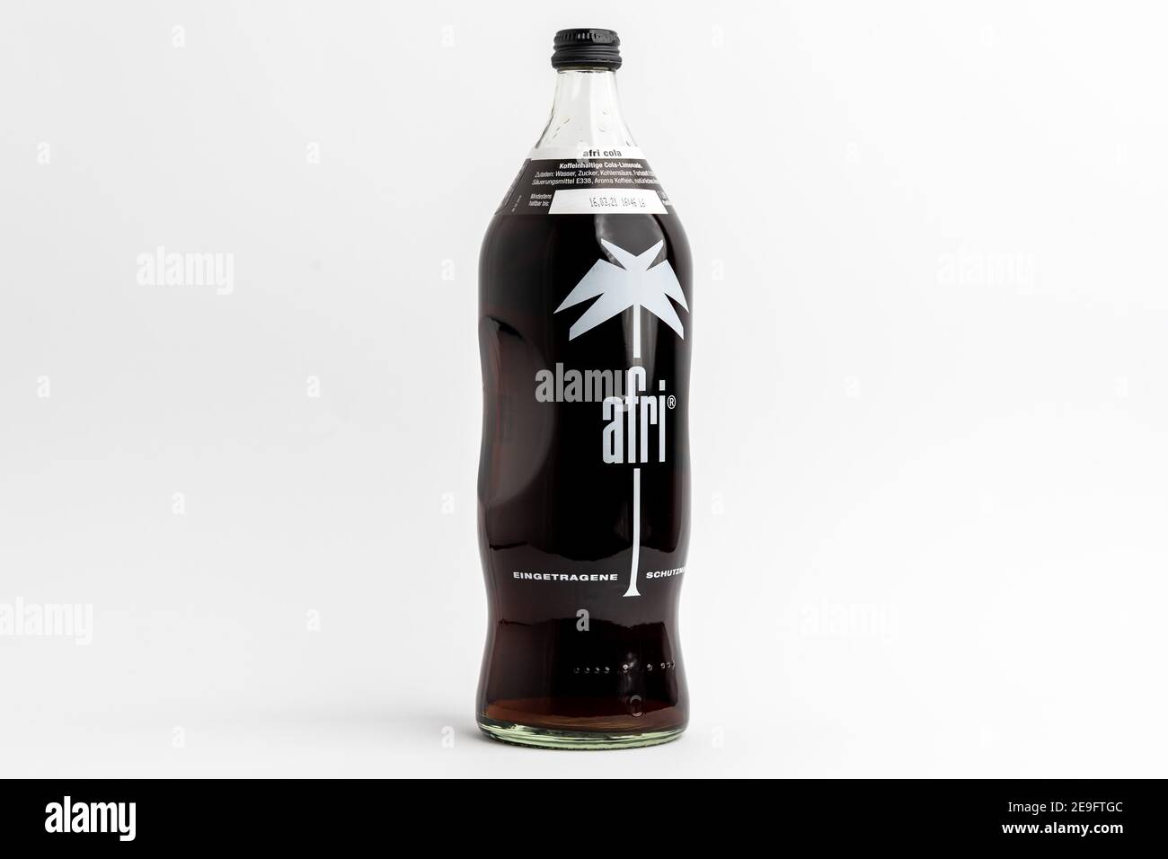 1 liter Afri Cola glass bottle in front of white background