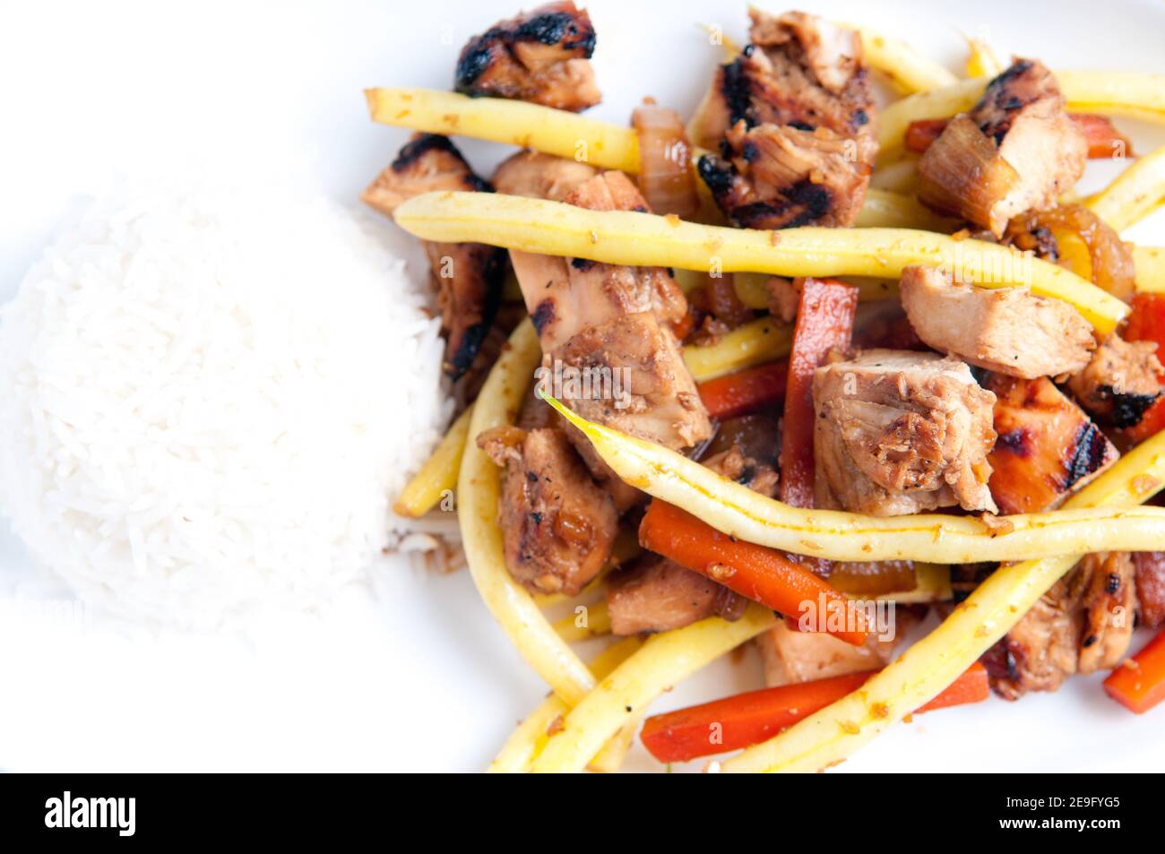 orange and ginger chicken thigh stir fry Stock Photo - Alamy