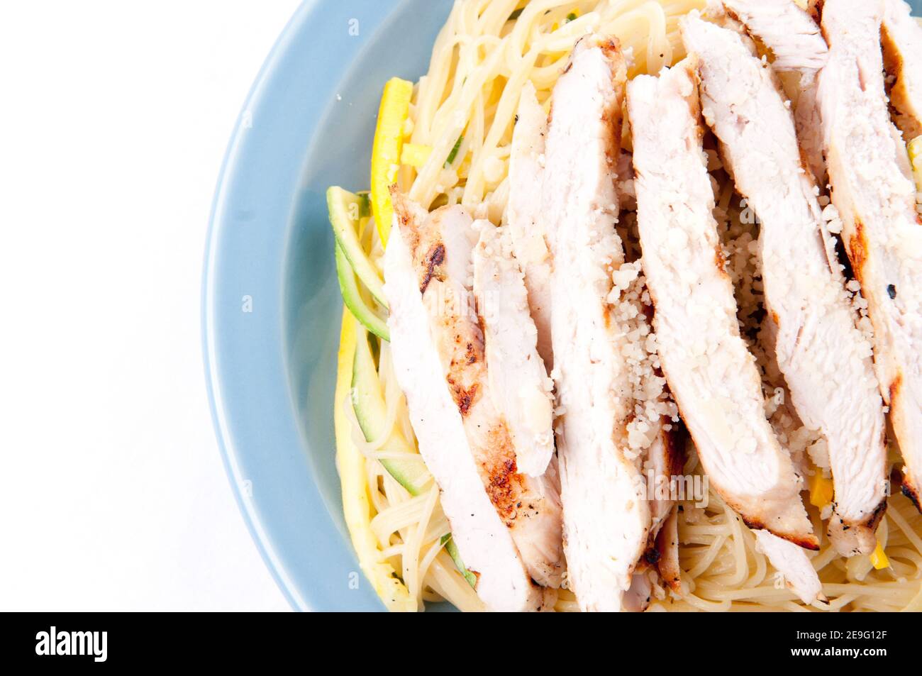 zucchini pasta and fresh chicken and parmesan Stock Photo Alamy