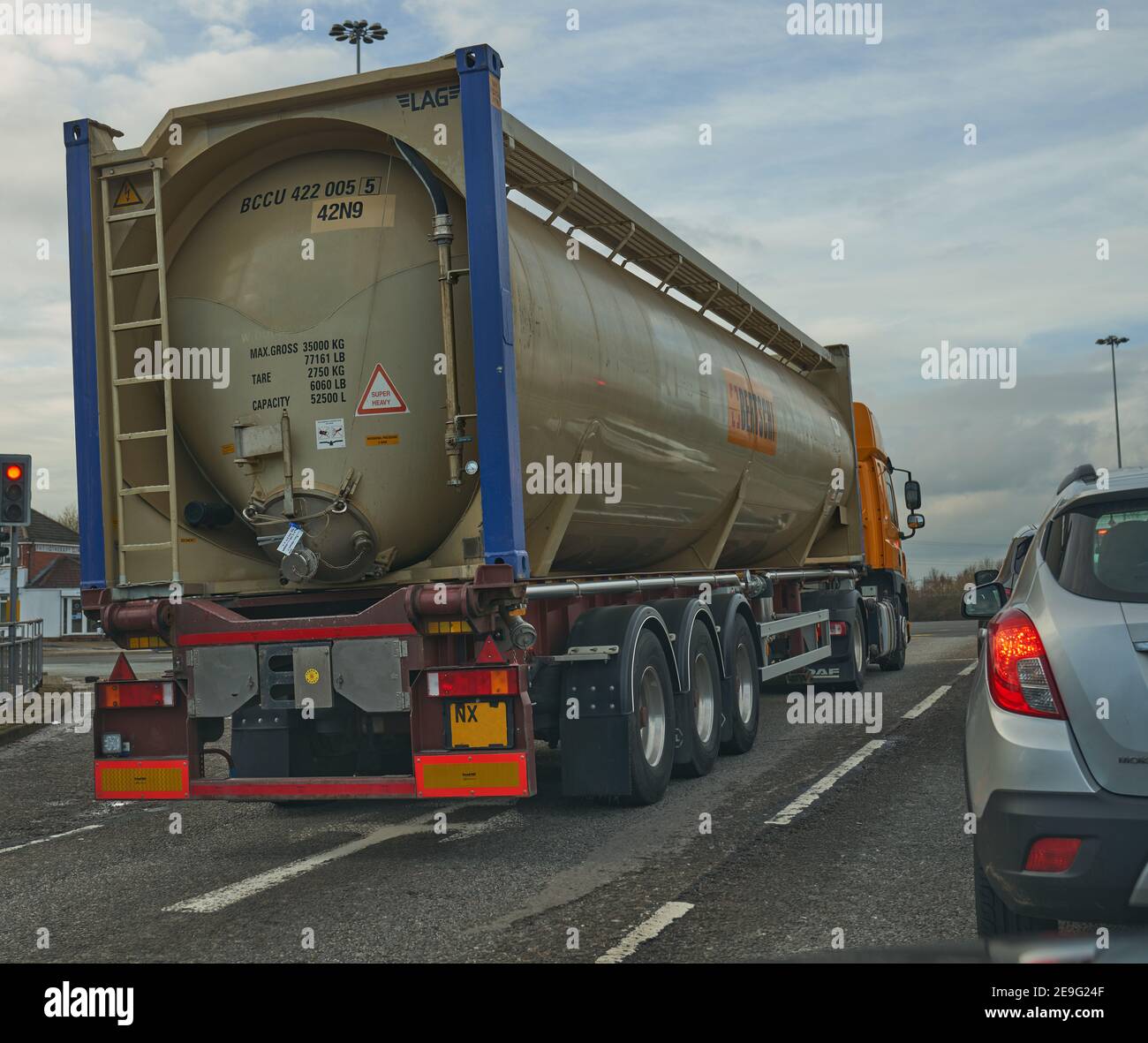 Tanker truck stopped at red traffic lights Stock Photo