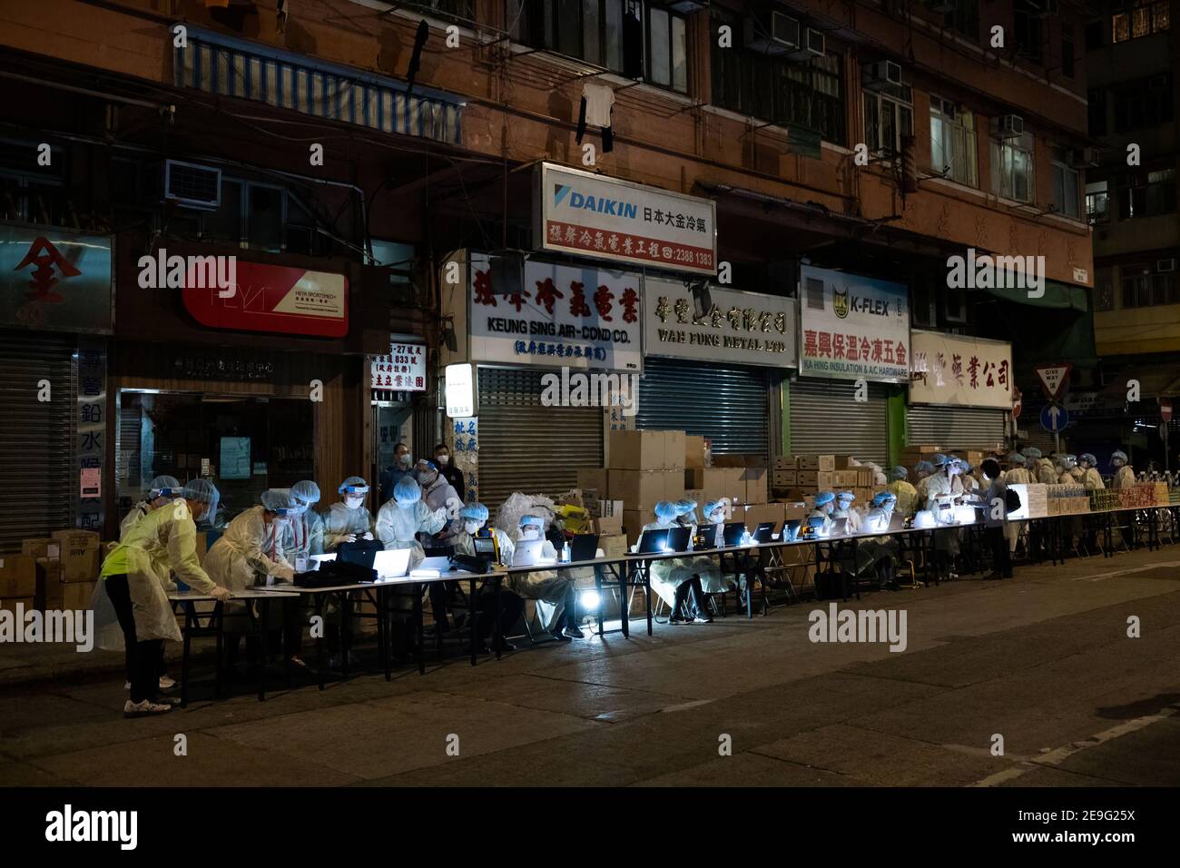 Health workers wearing personal protective equipment suits (PPE) during