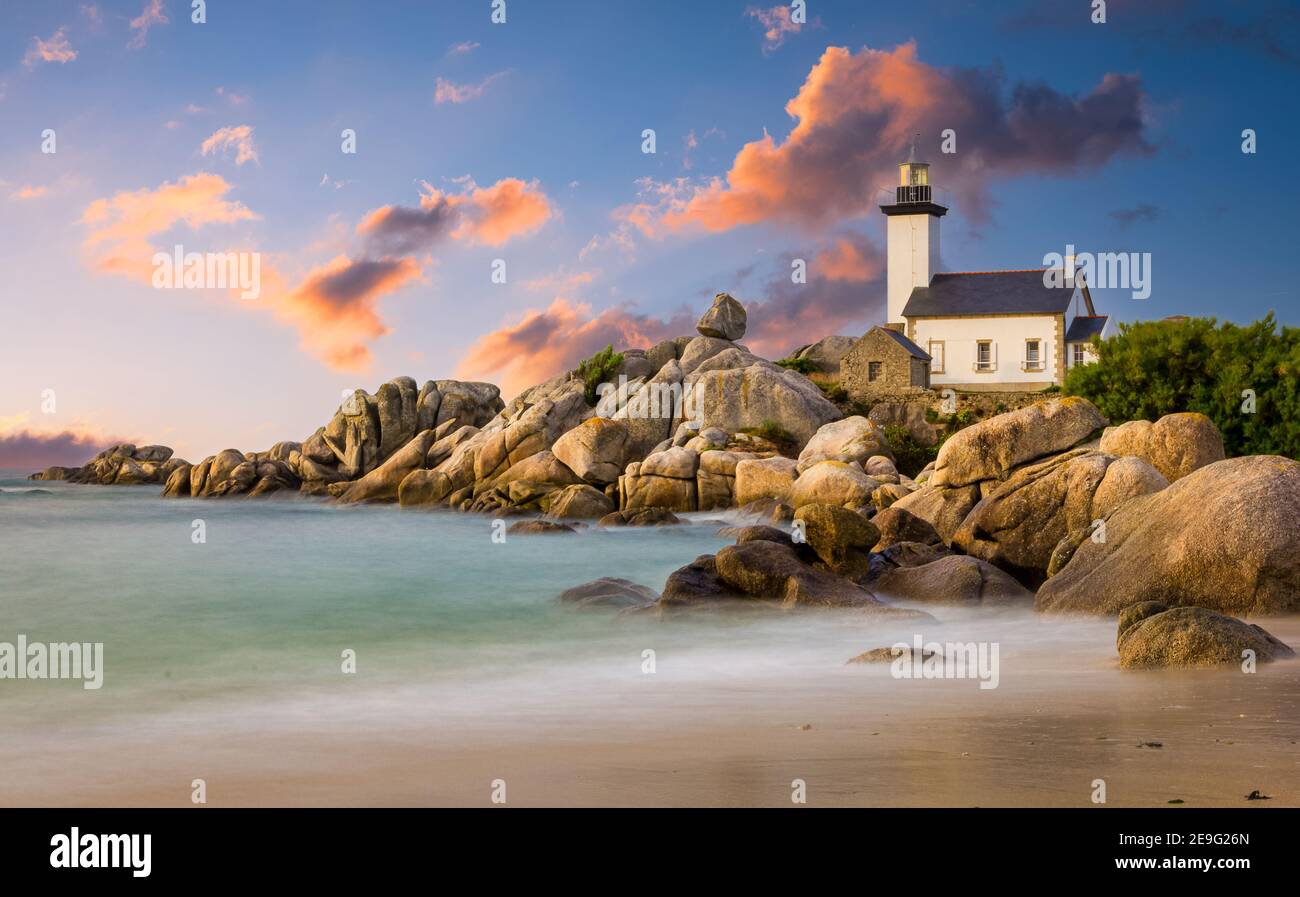 Sunset at the Pontusval Lighthouse in France Stock Photo