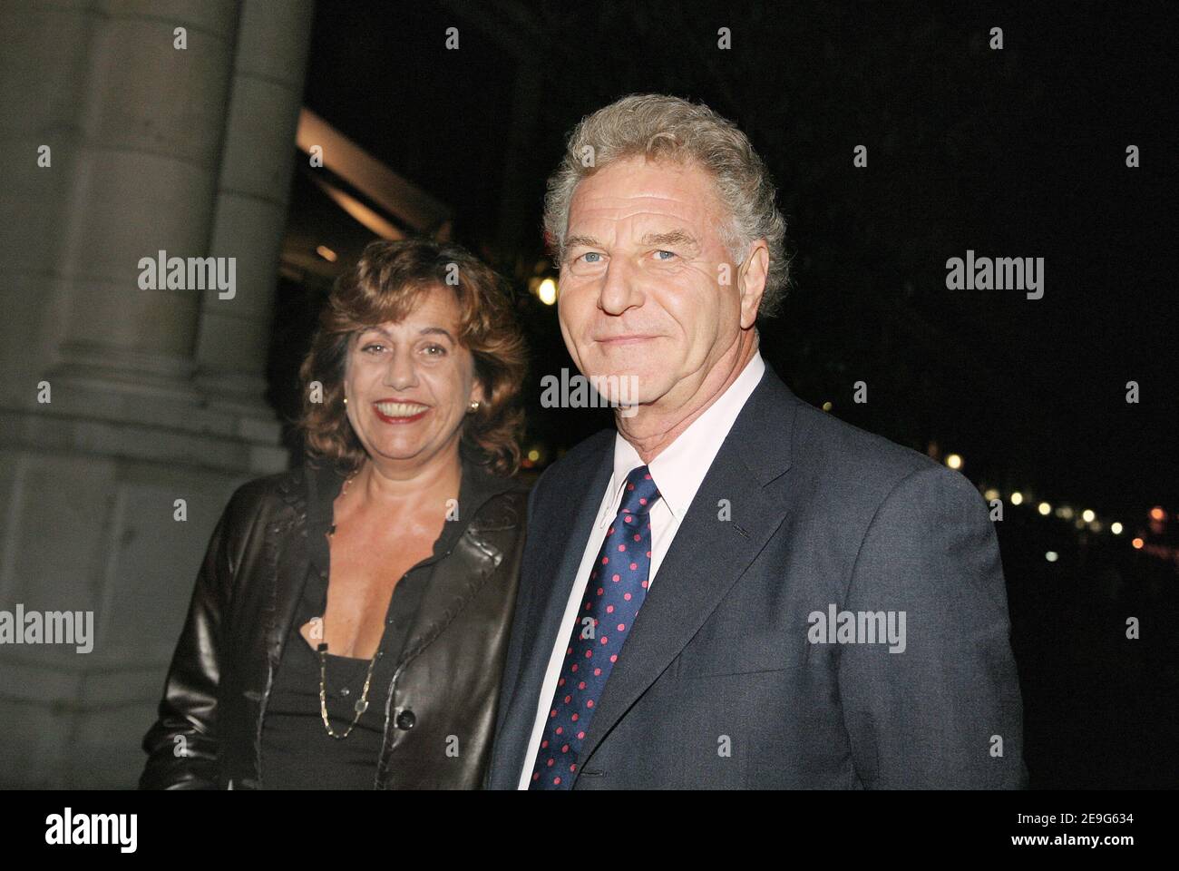 French TV journalists Robert Namias and his wife Anne Barrere arrive at the opening play of 'Les Grandes Occasions' with Jean Reno and Clementine Celarie at Edouard VII theatre in Paris, France on September 18, 2006. Photo by Denis Guignebourg/ABACAPRESS.COM Stock Photo