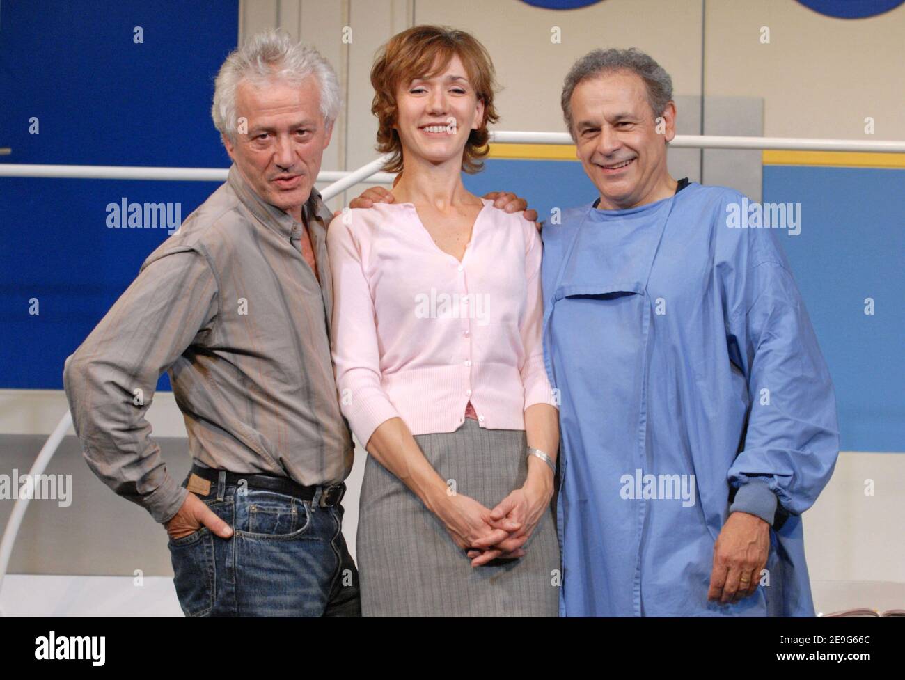 Director Jean-Luc Moreau and cast members Francis Perrin and Virginie  Lemoine pose together during the press rehearsals of their new play 'Si  c'etait a refaire' at the 'Theatre de la Renaissance' in