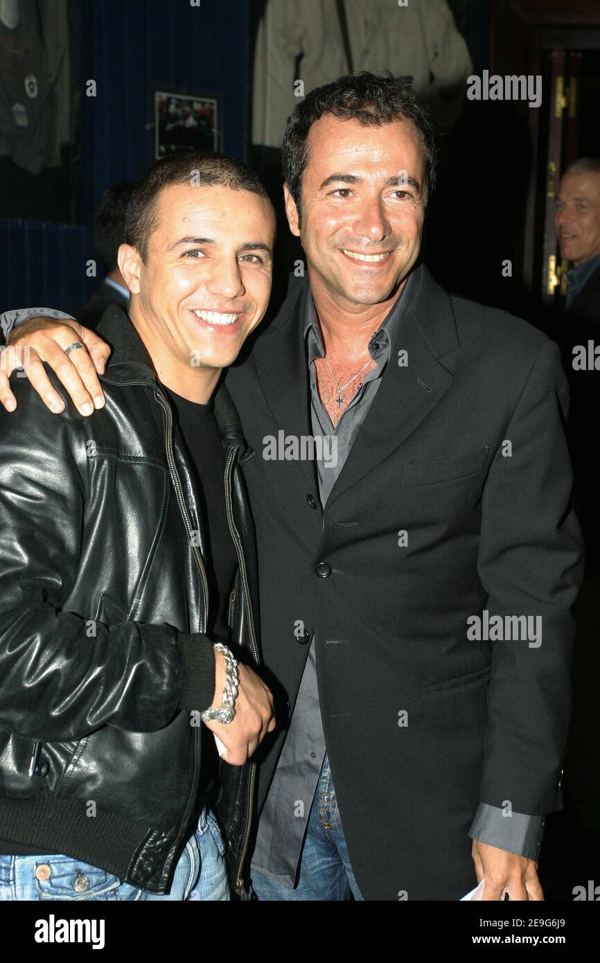 French singer Faudel and TV presenter Bernard Montiel attend the premiere of 'Le Diable s'Habille En Prada' at the Planete Hollywood in Paris, France, on September 19, 2006. Photo by Benoit Pinguet/ABACAPRESS.COM Stock Photo