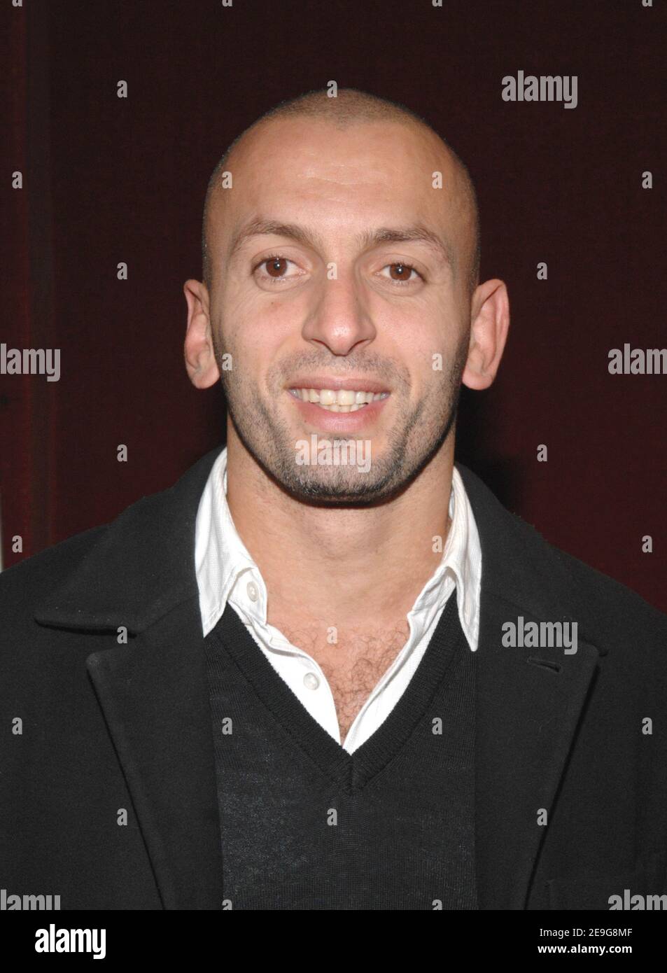 French judoka Djamel Bouras poses for pictures as he arrives to the