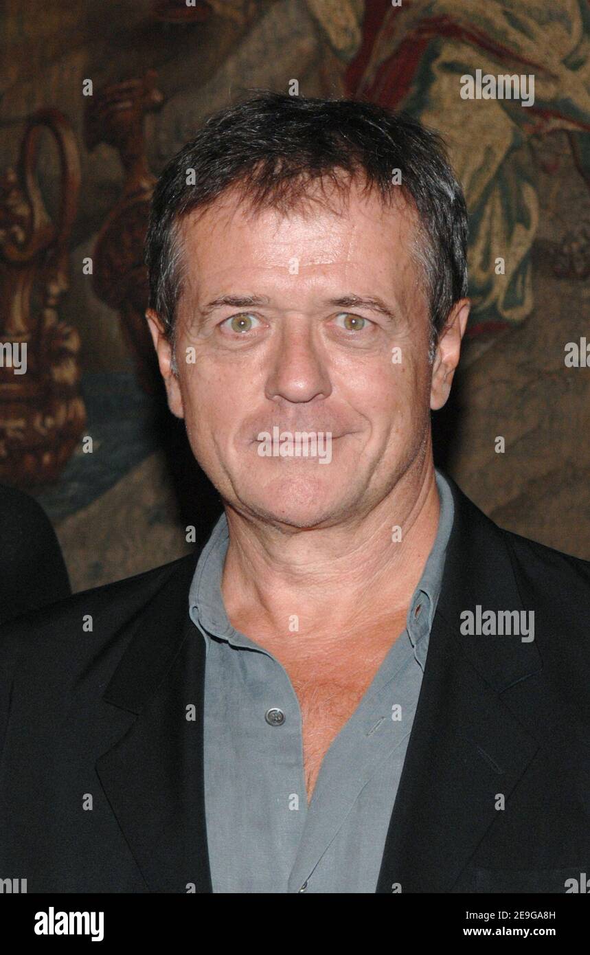 French director Patrice Chereau poses for pictures during a cocktail held at the Portuguese Embassy in Paris, France, on September 28, 2006. Both Fanny Ardant and Patrice Chereau will open Lisbon's Sao Carlos theatre new season with performances in French. Photo by Nicolas Khayat/ABACAPRESS.COM Stock Photo