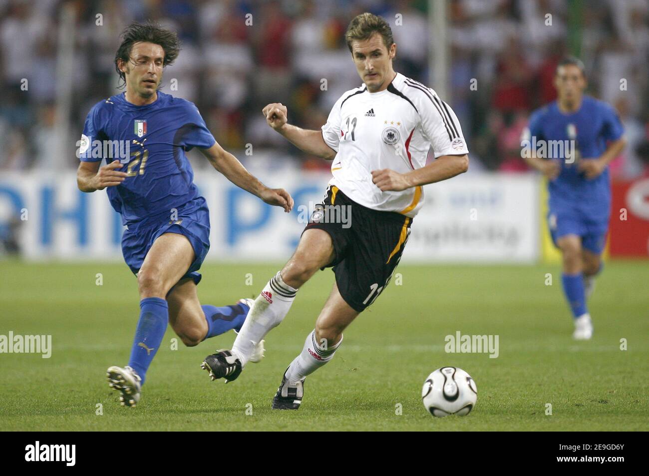 Italy's Andrea Pirlo and Miroslav Klose in action during the World Cup 2006, semifinals, Italy vs Germany at the Signal Iduna Park stadium in Dortmund, Germany on July 4, 2006. Italy won 2-0. Photo by Christian Liewig/ABACAPRESS.COM Stock Photo