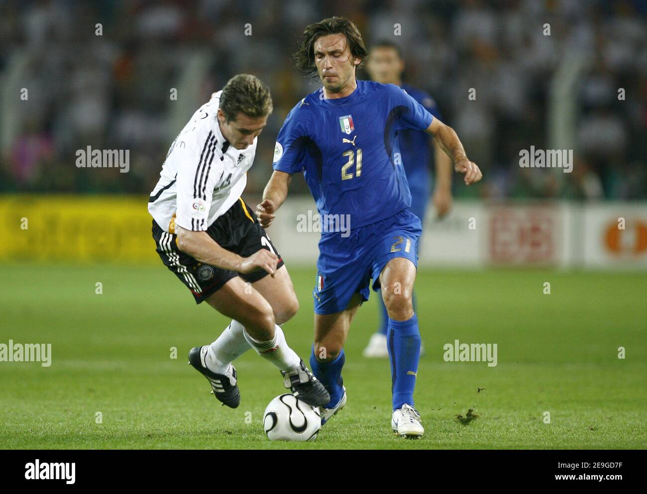 Miroslav Klose and Italy's Andrea Pirlo in action during the World Cup 2006, semifinals, Italy vs Germany at the Signal Iduna Park stadium in Dortmund, Germany on July 4, 2006. Italy won 2-0. Photo by Christian Liewig/ABACAPRESS.COM Stock Photo