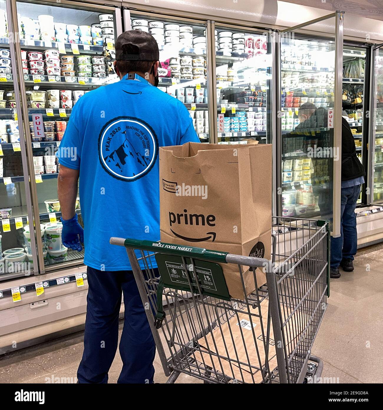Orlando Fl Usa January 24 21 Amazon Prime Fresh Employees Shopping At A Whole Foods Grocery Store Selecting Food For For People To Have Deliver Stock Photo Alamy