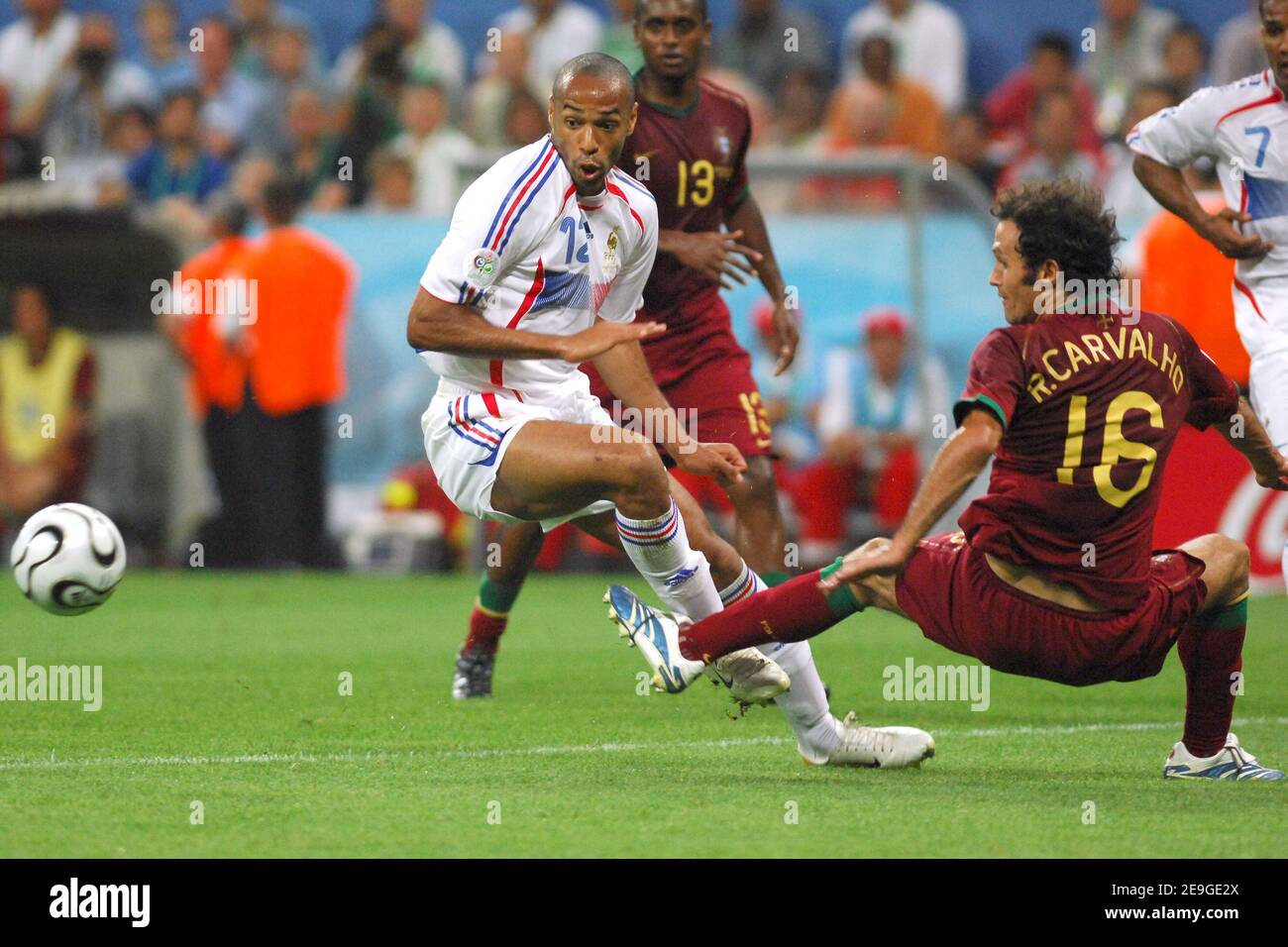 Portugal's Alberto Ricardo Carvalho fouls France's Thierry Henry giving away a penalty during the World Cup 2006, semi-final, France vs Portugal at the Allianz-Arena stadium in Munich, Germany on July 5, 2006. France won 1-0 and advanced to the final. Photo by Gouhier-Hahn-Orban/Cameleon/ABACAPRESS.COM Stock Photo