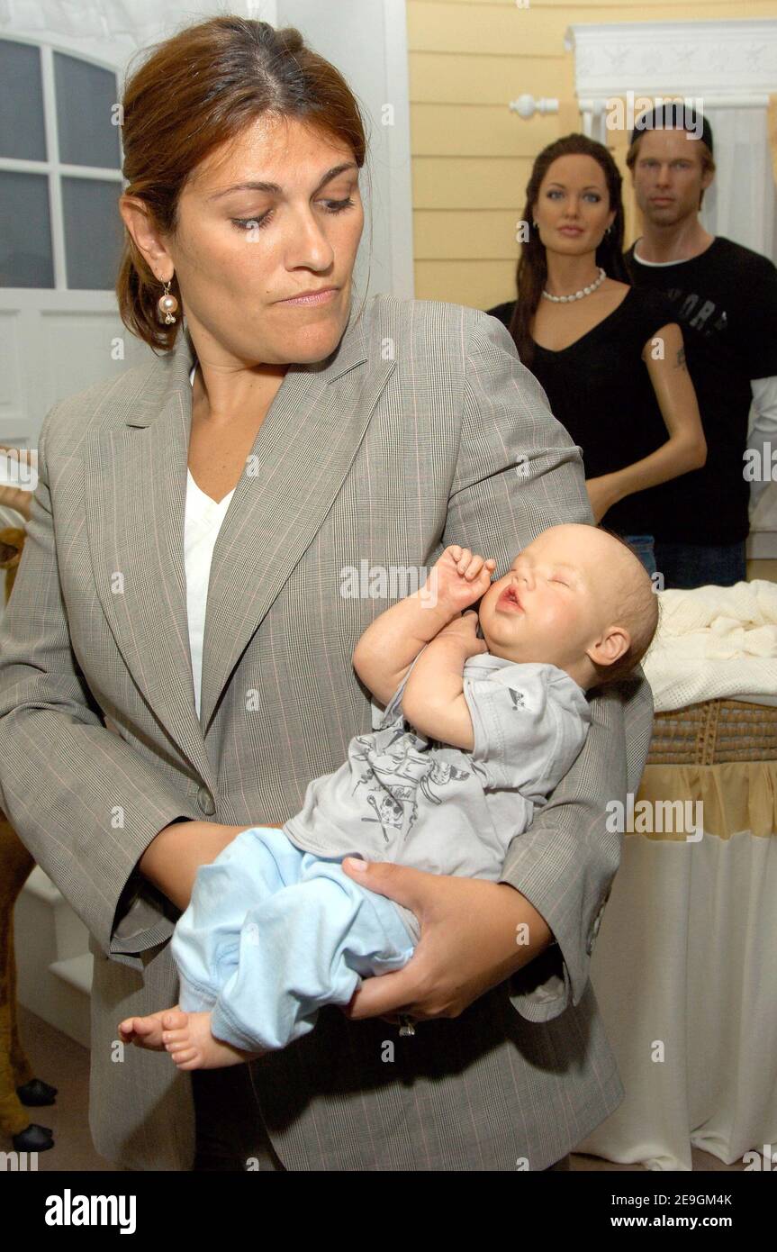 The Shiloh Nouvel Jolie Pitt wax figure is held by Madame Tussauds General Manager Janine DiGioacchino during its debut at Madame Tussauds on Wednesday, July 26, 2006 in New York City, New York. Photo by Gregorio Binuya/ABACAPRESS.COM Stock Photo