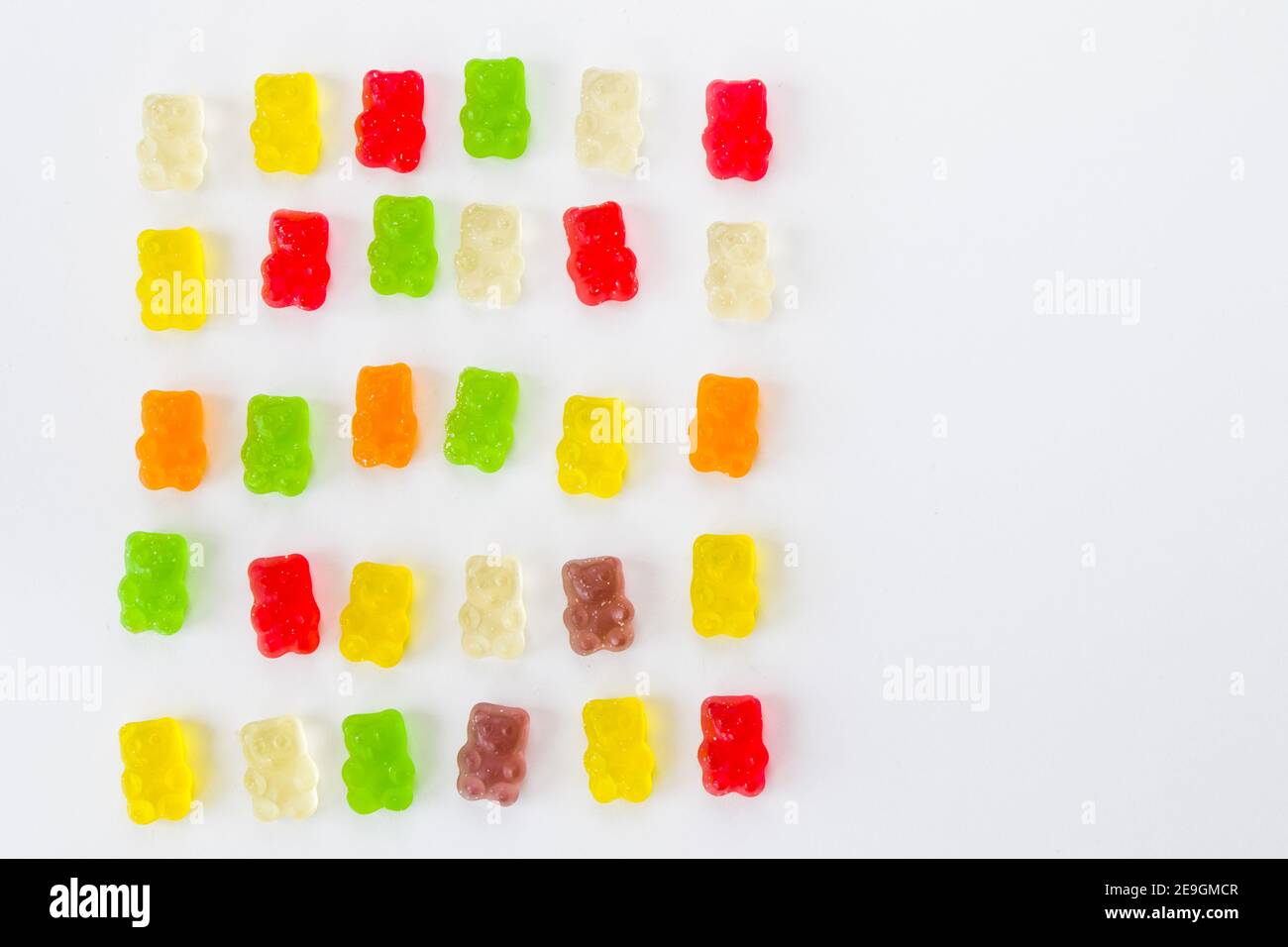 Top view shot of a gummy bear pile on an isolated white surface Stock