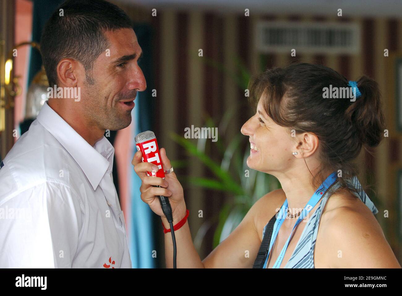 French former swimmer Roxana Maracineanu interviews French former swimmer Franck Esposito during the european swimming championships in Budapest, Hungary, on July 29, 2006. Photo by Nicolas Gouhier/Cameleon/ABACAPRESS.COM Stock Photo