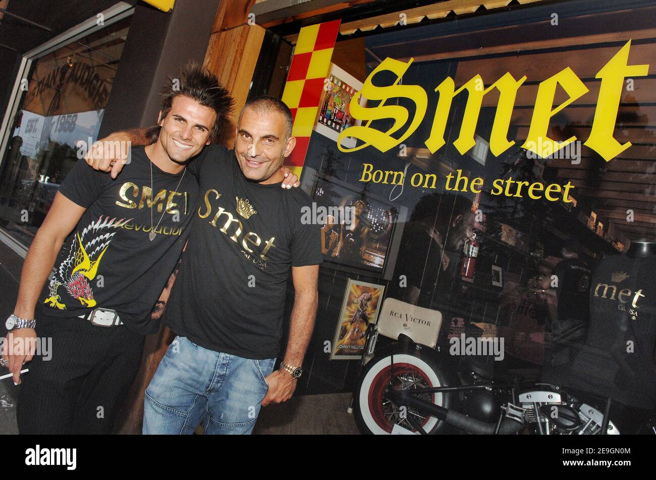Christian Audigier presents, with Jeremy Jackson, 'Smet ', his latest fashion collection honoring French rock legend Johnny Hallyday in his store of Melrose Avenue in Los Angeles, CA, USA on July 29, 2006. Photo by Lionel Hahn/ABACAPRESS.COM Stock Photo