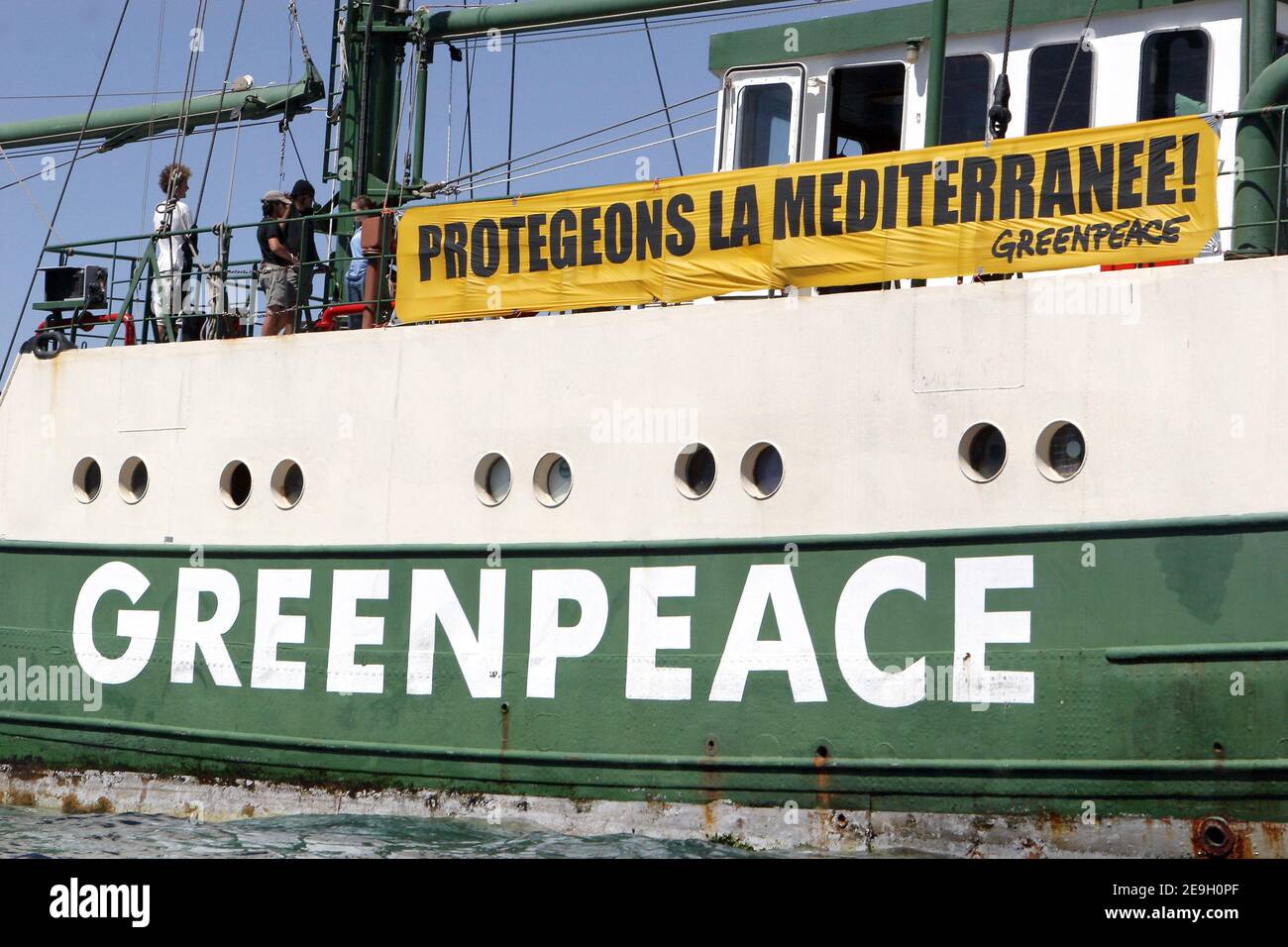 Greenpeace's Rainbow Warrior II is circled by tuna fishing vessels to prevent it from docking, as it tries to move into Marseille's harbour, August 23, 2006. Fishermen in the southern French port city of Marseille have used Greenpeace's own tactics against it to prevent the environmental activist group's flagship from docking.. Rainbow Warrior II campaigns to save dwindling red tuna stocks. Photo by Gerald Holubowicz/ABACAPRESS.COM Stock Photo