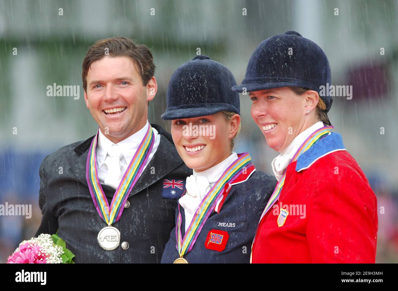 (L-R) Australia's Clayton Fredericks silver medal, Great Britain's Zara Pillips individual gold medal and silver team medal, USA's Amy Tryon bronze medal during the awarding ceremony of the Eventing individual competition of the World Equestrian Games in Aachen, Germany on August 27, 2006. Photo by Edwin Cook/Cameleon/ABACAPRESS.COM Stock Photo