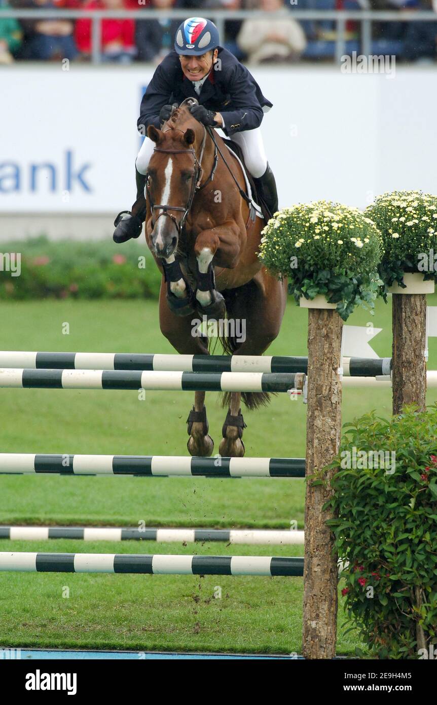 France's Michel Robert on his horse 'Galet D'Auzay' at the first