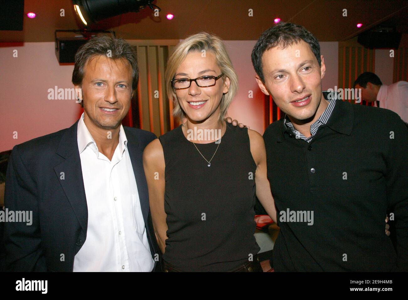 Vincent Perrot, Laurence Ferrari and Marc-Olivier Fogiel pose during the  annual press conference of French radio station RTL , rue Bayard in Paris,  France on August 29, 2006. Photo by Mehdi Taamallah/ABACAPRESS.COM