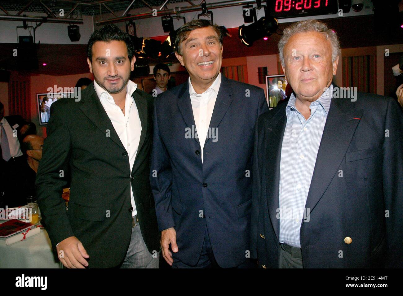 Cyril Hanouna, Jean-Pierre Foucault and Philippe Bouvard pose during the  annual press conference of French radio station RTL , rue Bayard in Paris,  France on August 29, 2006. Photo by Mehdi Taamallah/ABACAPRESS.COM