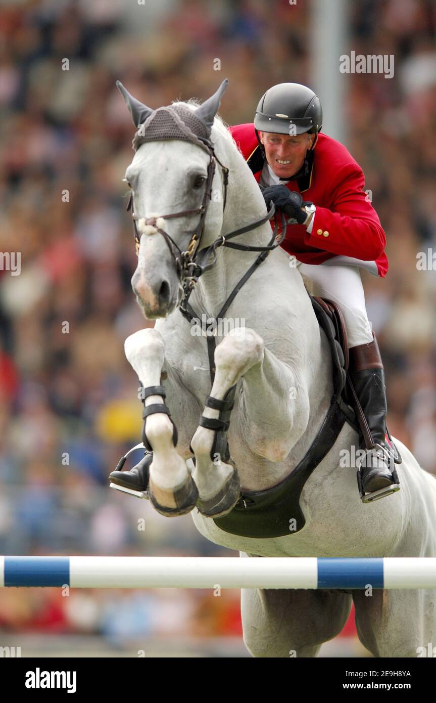 Belgium's Jos Lansink on his horse 'Cumano' during the Final for the