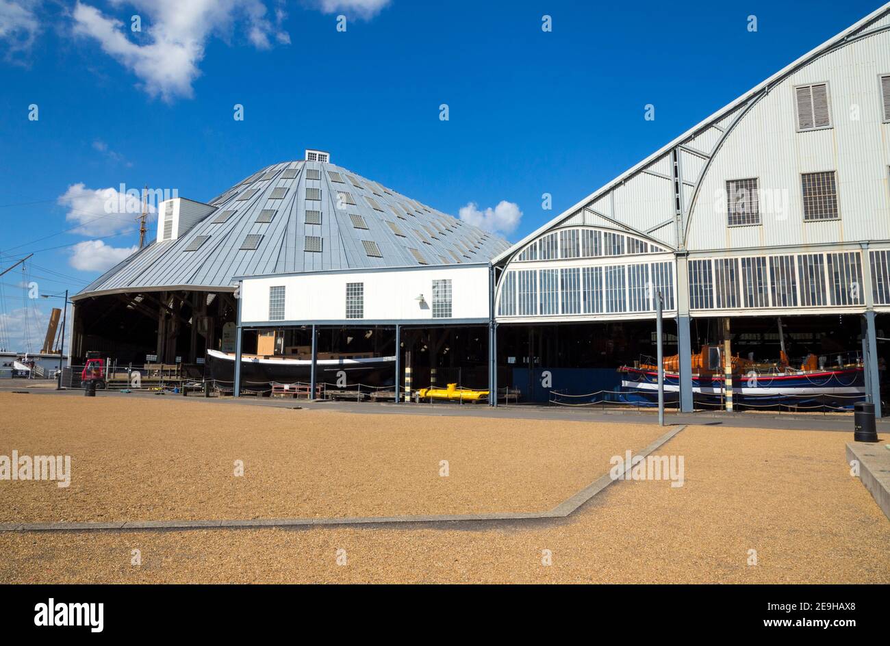 Front facade & entrance to the  Number 3 boathouse (Big Space) left, and right, Number 4 boathouse (covered slip). Chatham historic dockyard England UK. (121) Stock Photo