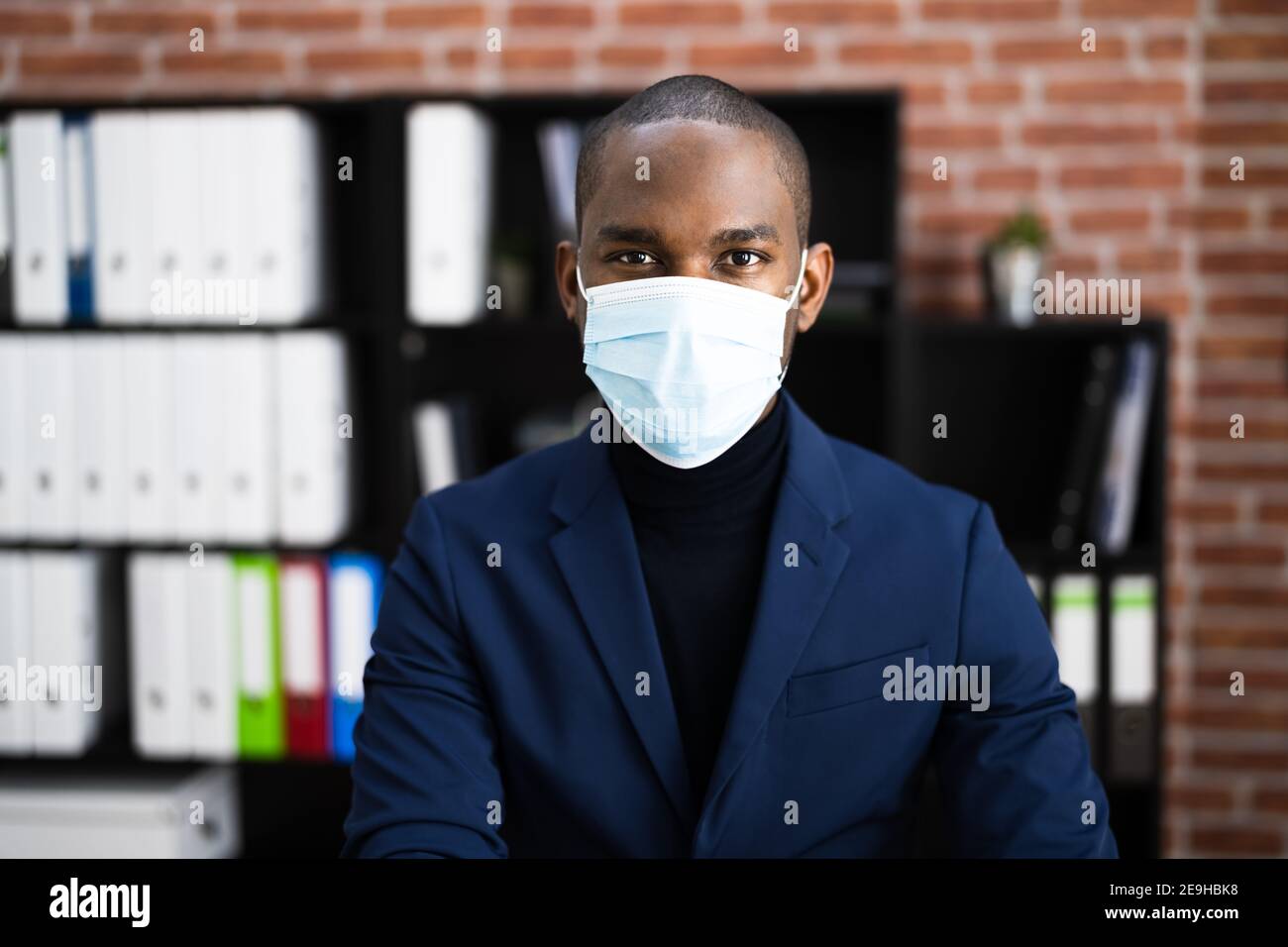 Black men wearing mask hi-res stock photography and images - Alamy