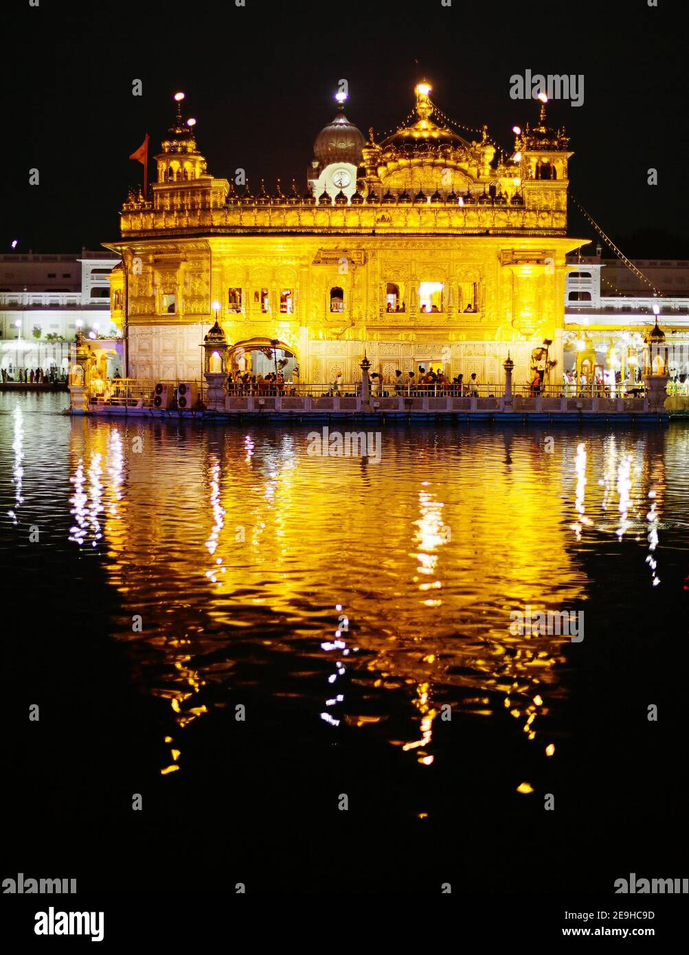 Nightly view of Golden Temple - Sikhs holy place in Amritsar - India Stock Photo