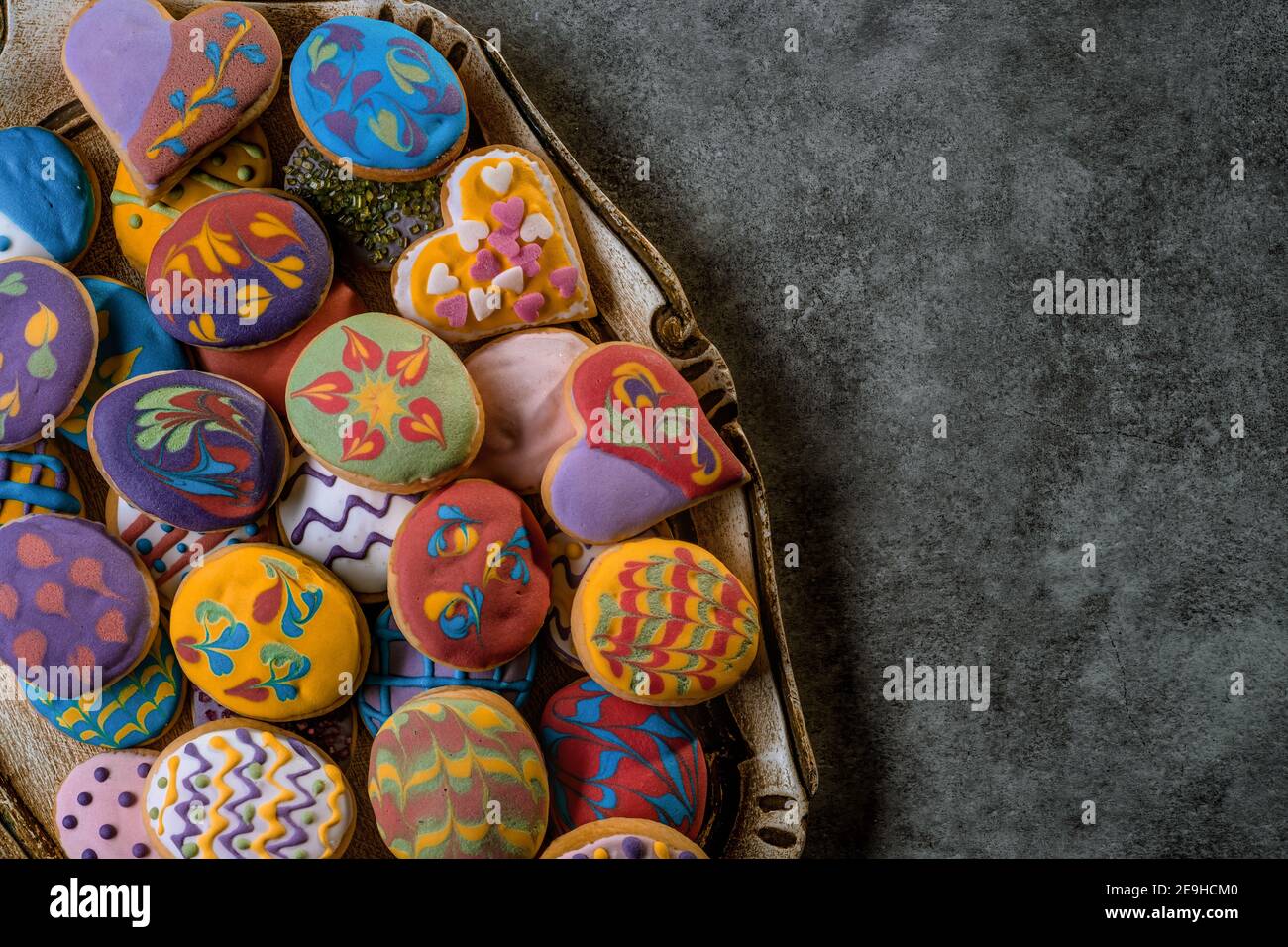 Homemade, freshly baked and decorated, colorful Easter cookies. Stock Photo