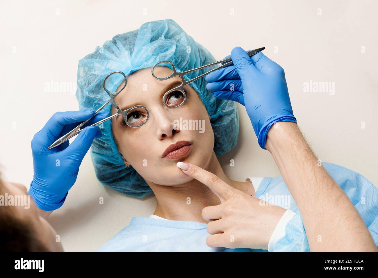 Funny consultation with jokes of plastic surgeon in medical center