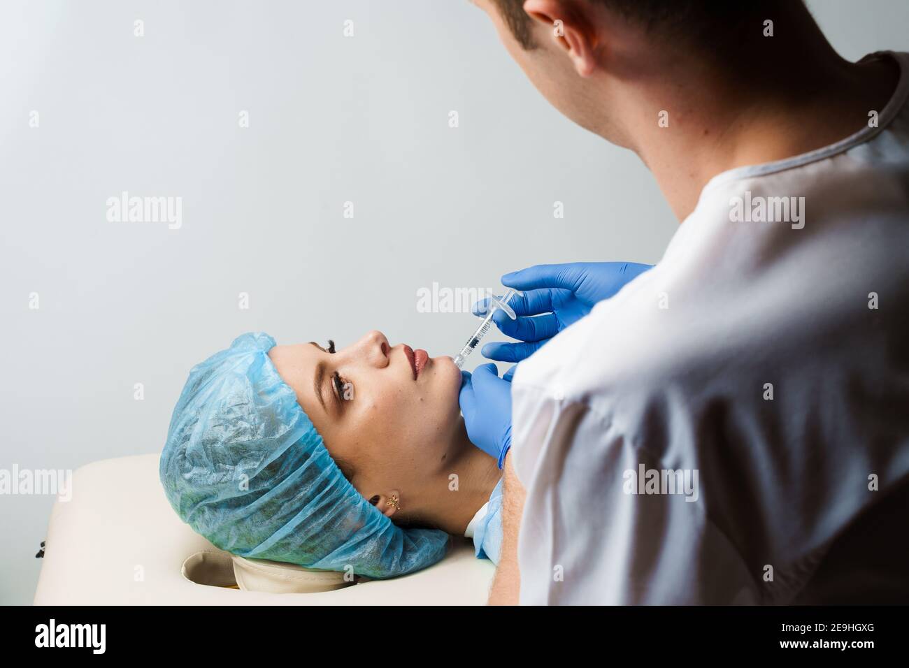 Filler injection of hyaluronic acid. Contour plastic for correcting the ...