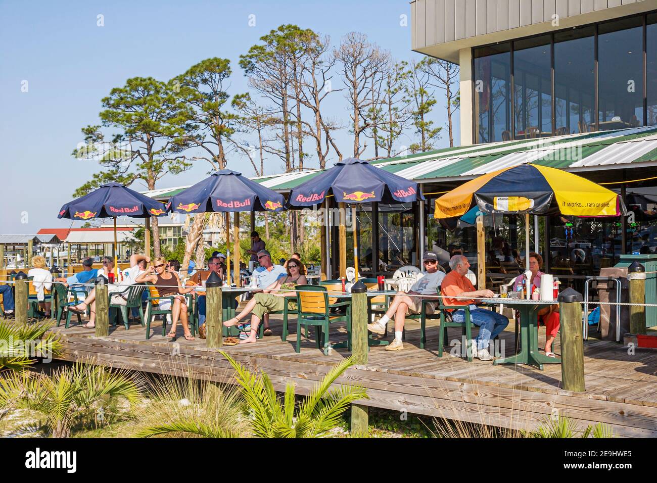 Alabama Orange Beach Zeke's Landing restaurant dining,al fresco dockside umbrellas tables, Stock Photo