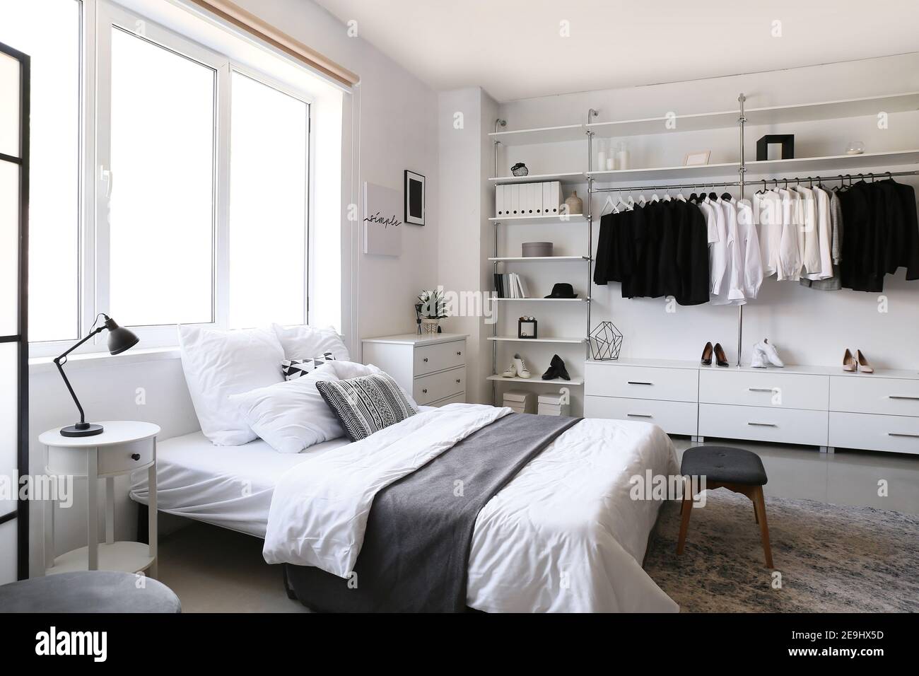 Interior of white modern bedroom with wardrobe Stock Photo Alamy