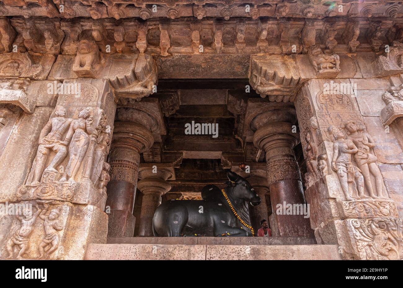 Bagalakote, Karnataka, India - November 7, 2013: Pattadakal temple complex. Closeup of side of Brown stone Nandi shrine in front of Virupaksha temple. Stock Photo