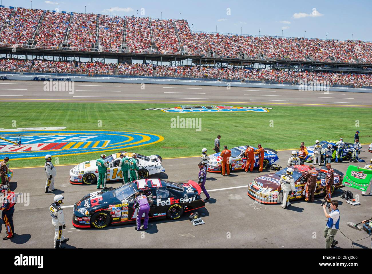 Alabama Talladega Superspeedway Aaron's 499 NASCAR Nextel Cup Series,stock car racing Pit Road drivers crews cars,pre-race preparation preparing fans Stock Photo