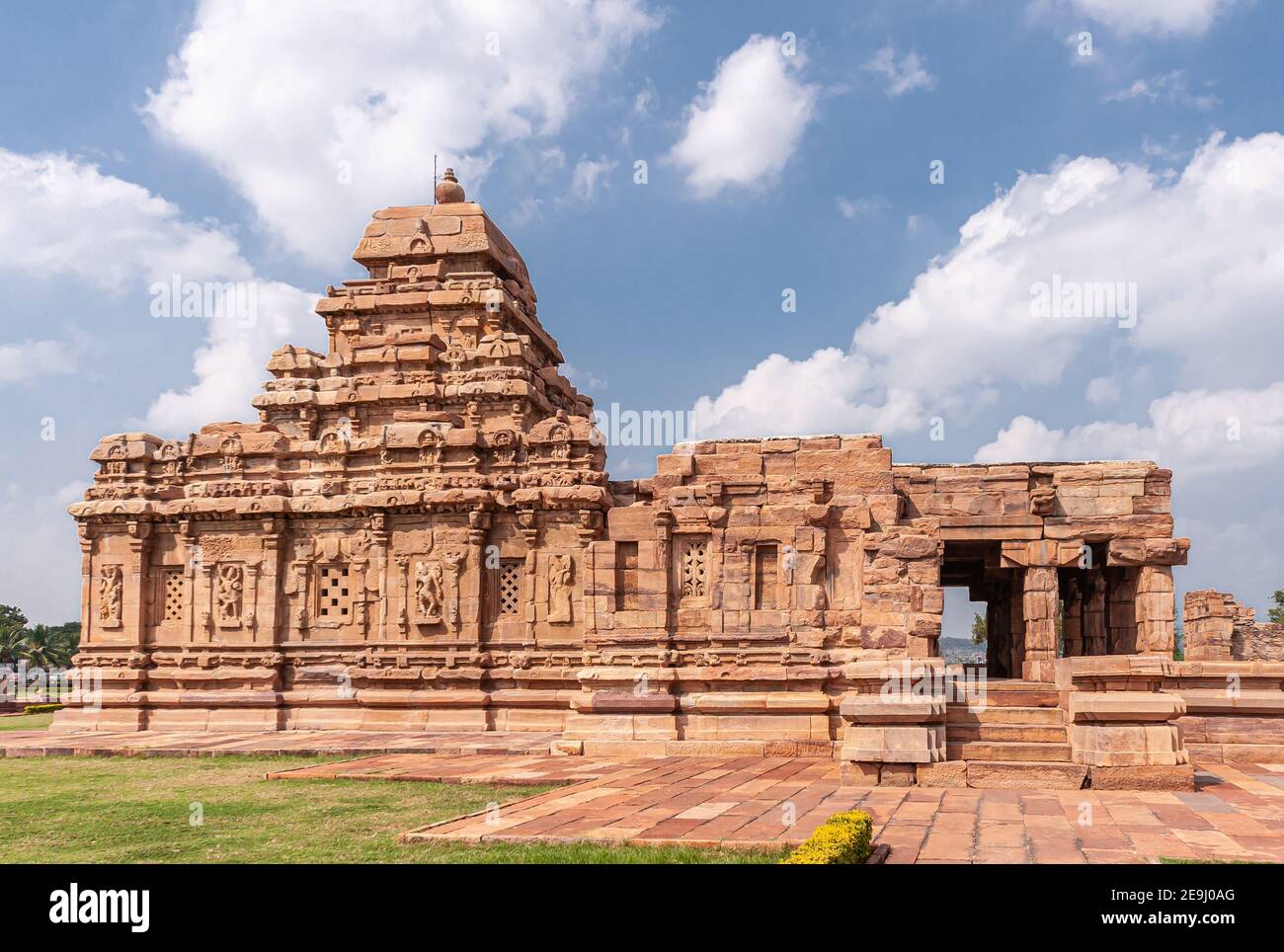 Bagalakote, Karnataka, India - November 7, 2013: Pattadakal temple complex. Side closeup of Brown stone Sangameshwara Temple side closeup under blue c Stock Photo