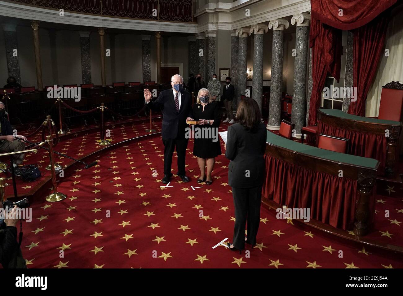 Sen. Patrick Leahy (D-Vt.) participates in a ceremonial swearing in photo op with his wife Marcelle Pomerleau and Vice President Harris on Thursday, February 4, 2021 in the Old Senate Chamber at the U.S. Capitol in Washington, DC.Credit: Greg Nash/Pool via CNP | usage worldwide Stock Photo